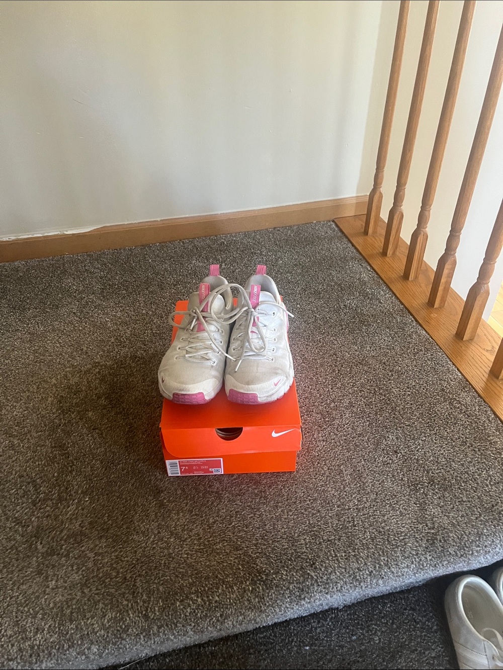 Nike Kids White Sneakers with Pink Accents